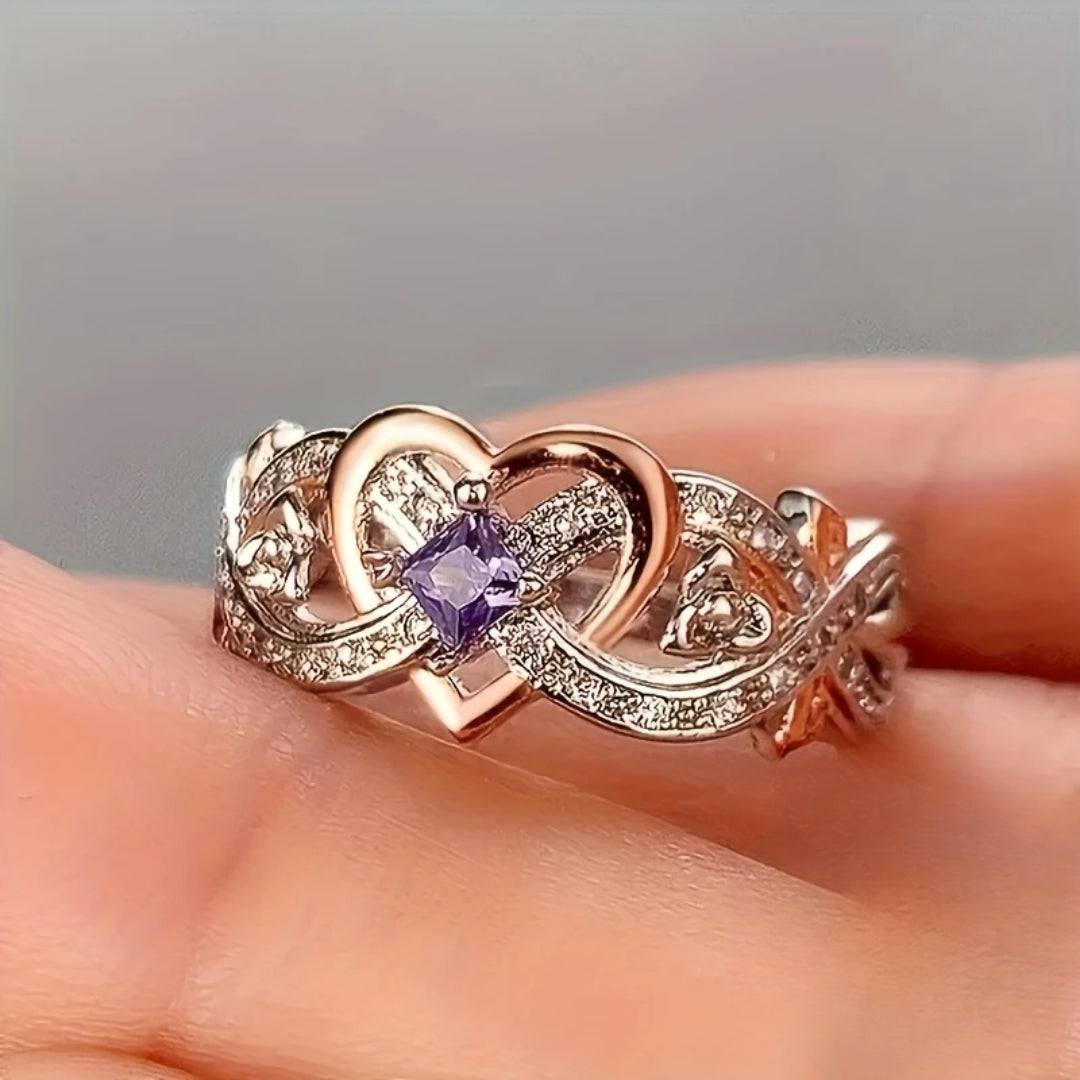 Bague en cœur en or et argent violet brillant
