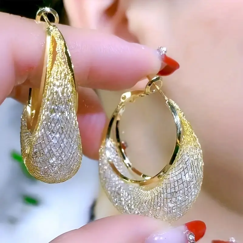 Boucles d'oreilles en panier doré brillant