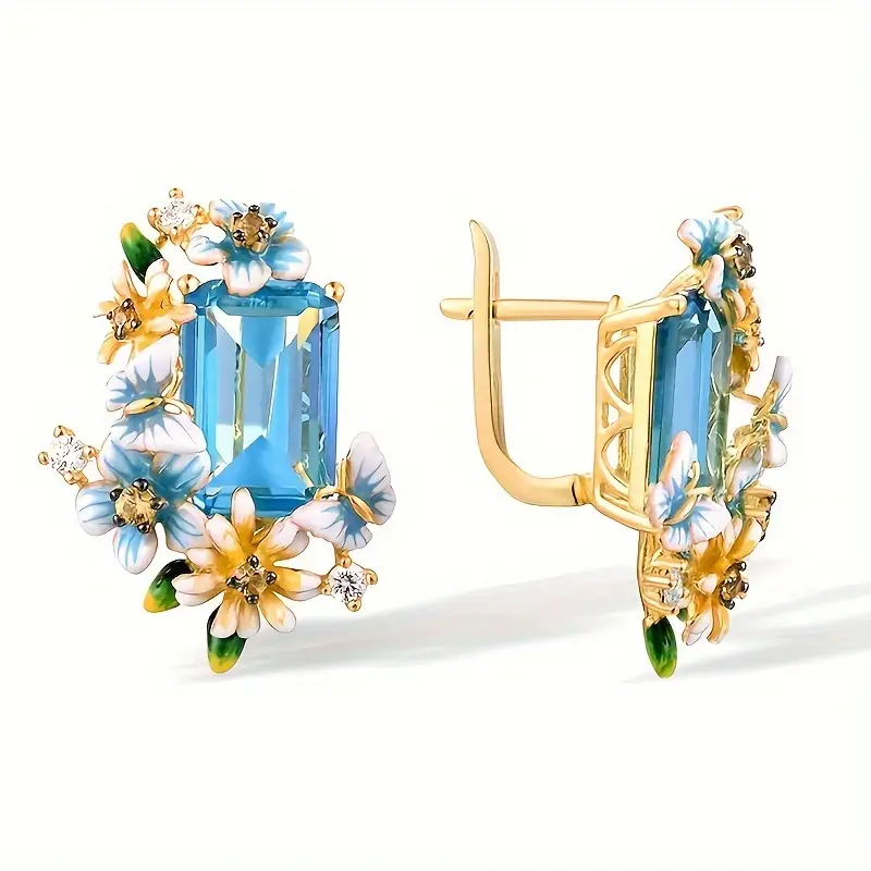 Boucles d'oreilles en or avec fleurs en cristal bleu
