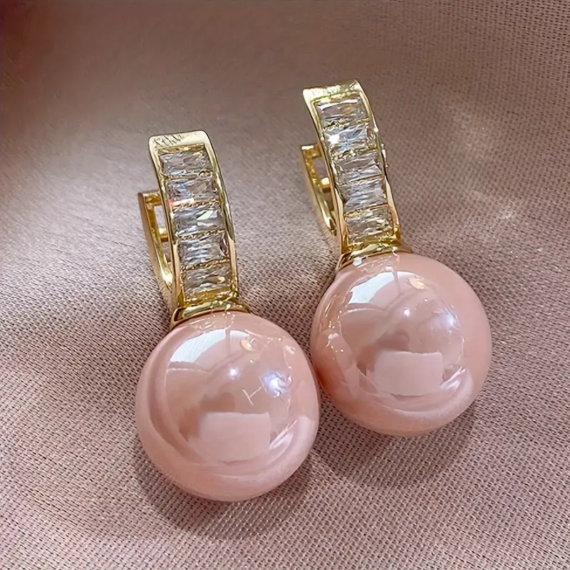 Boucles d'oreilles en zircone rose et or