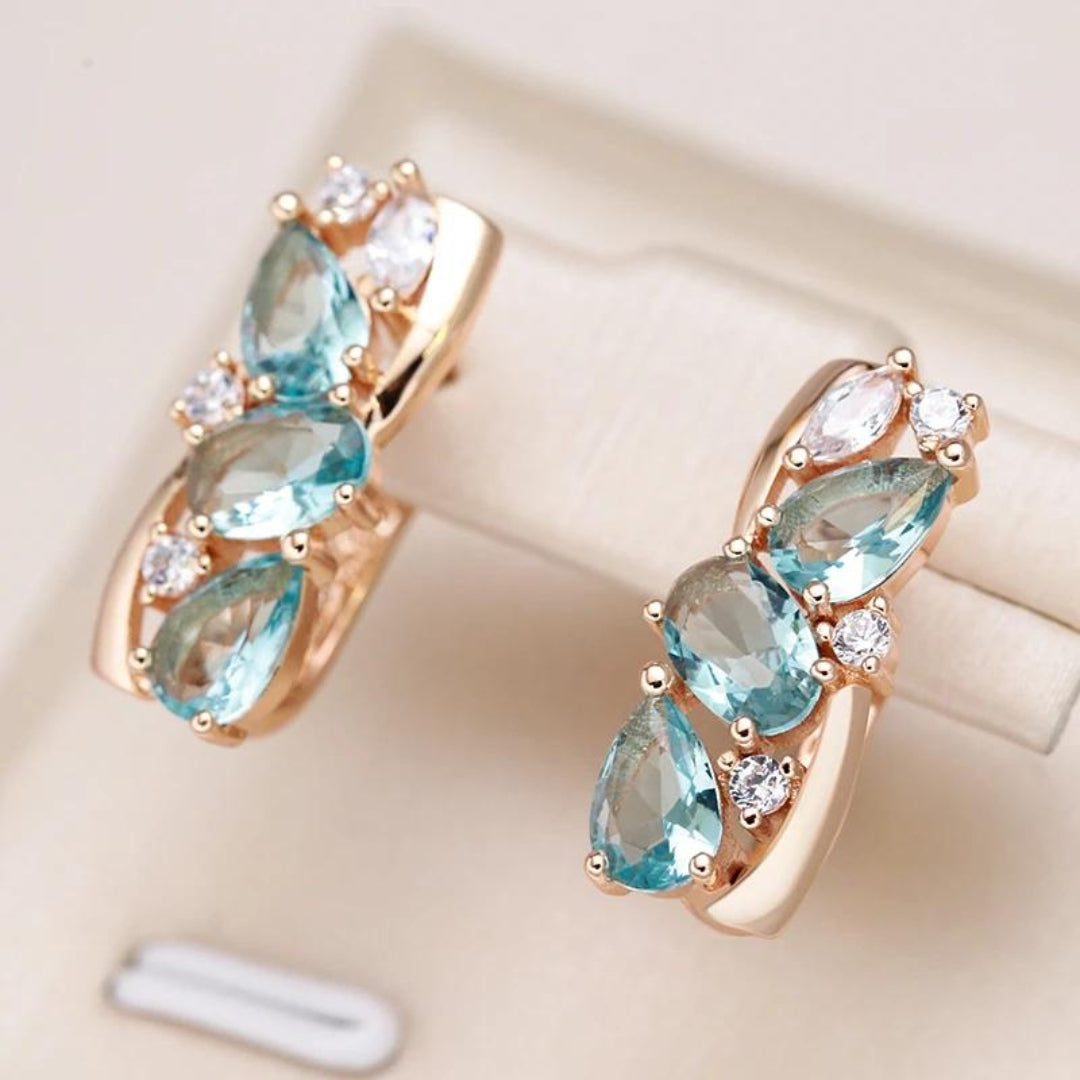 Boucles d'oreilles en zircon bleu en or