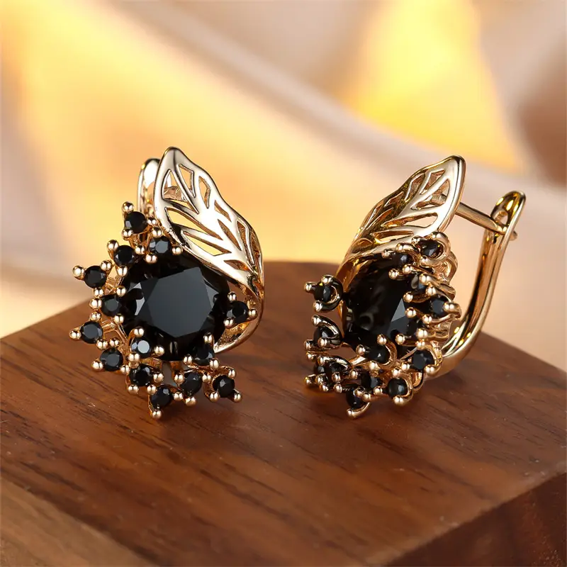 Boucles d'oreilles en zircone noire dorées