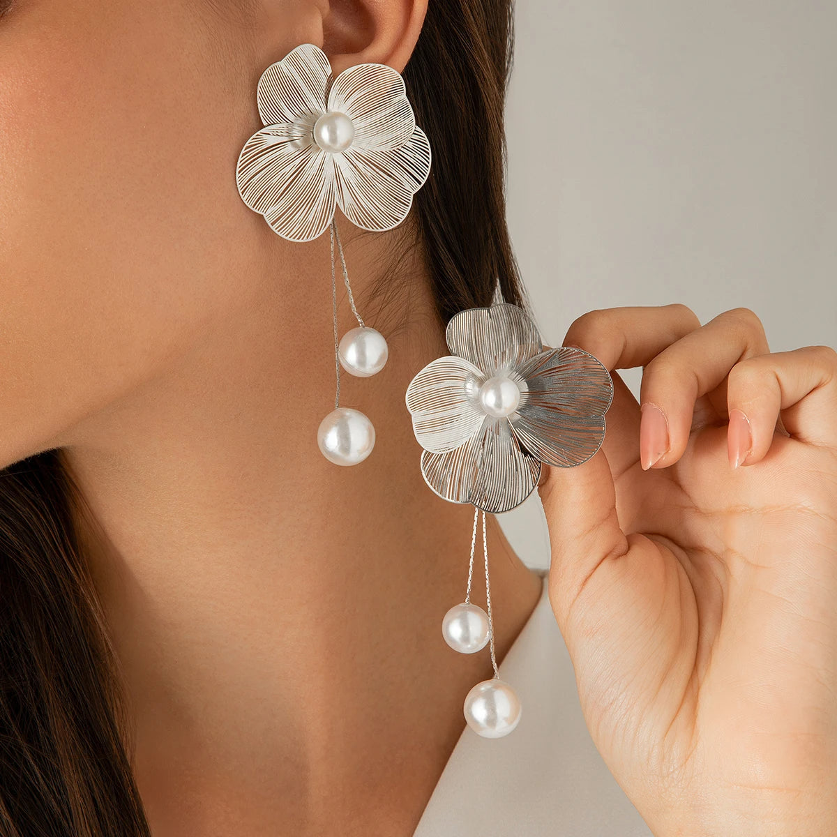 Boucles d'oreilles bohèmes avec perles et pétales