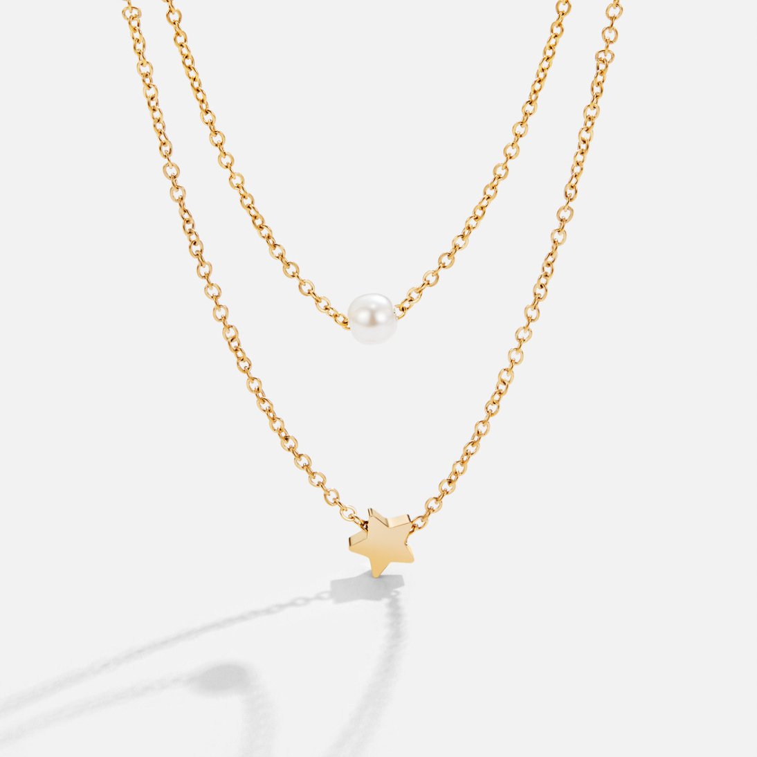 Collier avec étoile et perle